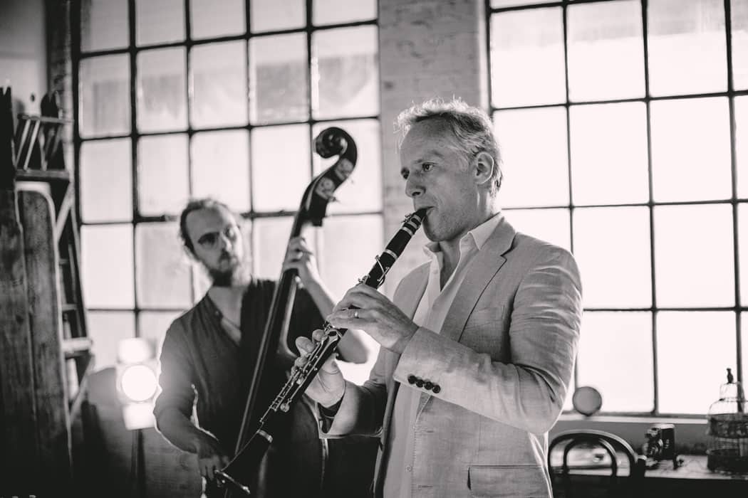 David Horniblow filming with The Dime Notes black and white