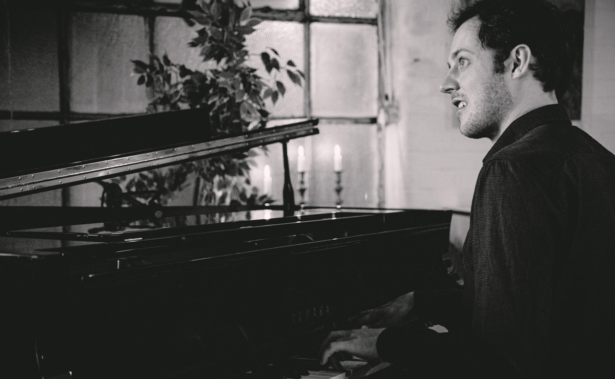 Sam Watts playing piano