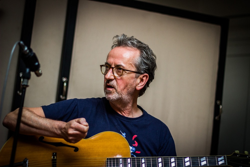 Recording studio shot of UK guitarist Dave Kelbie playing guitar and recording with The Viper Club